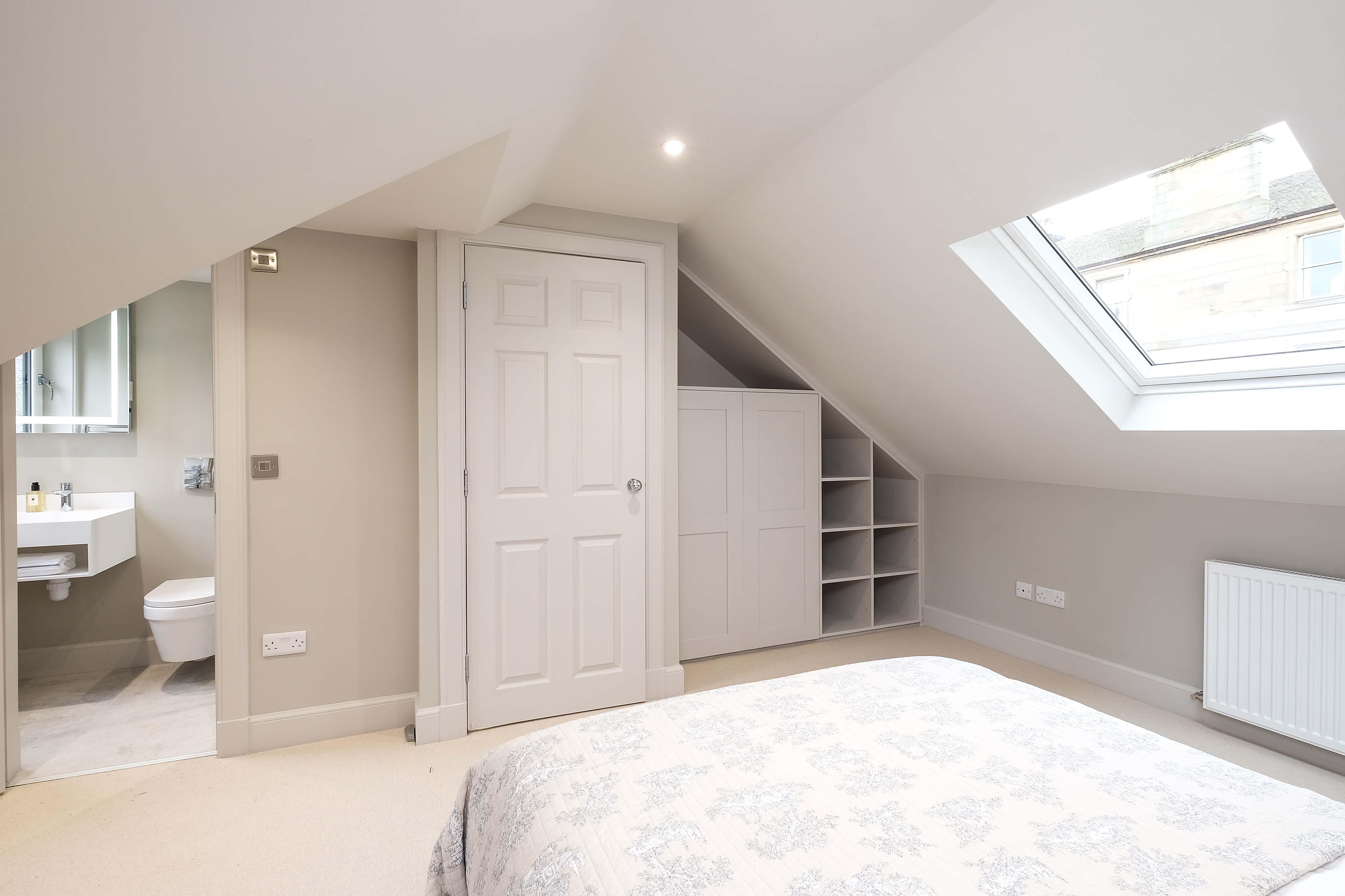 Loft conversion bedroom Edinburgh with bespoke storage